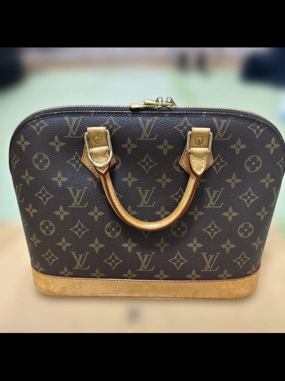 Louis Vuitton Brown Monogram Alma PM Handbag
